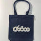 TOTE BAG DENIM CON TELA DE BORREGUITO CRUDO BORDADO