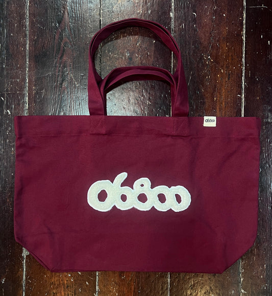 SHOPPING BAG BURDEOS CON TELA IMITACIÓN BORREGUITO CRUDO