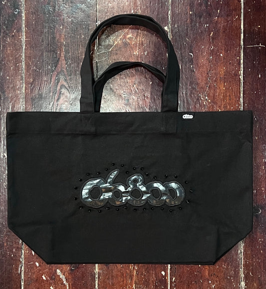 SHOPPING BAG NEGRO CON POLIPIEL Y REMACHES DE PINCHOS