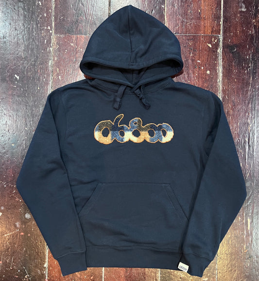 SUDADERA AZUL MARINO CON TELA DE BORREGUITO A CUADROS Y BORDADO