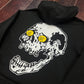 SUDADERA NEGRA CALAVERA CON MONEDAS EN LOS OJOS "CARONTE" 06800