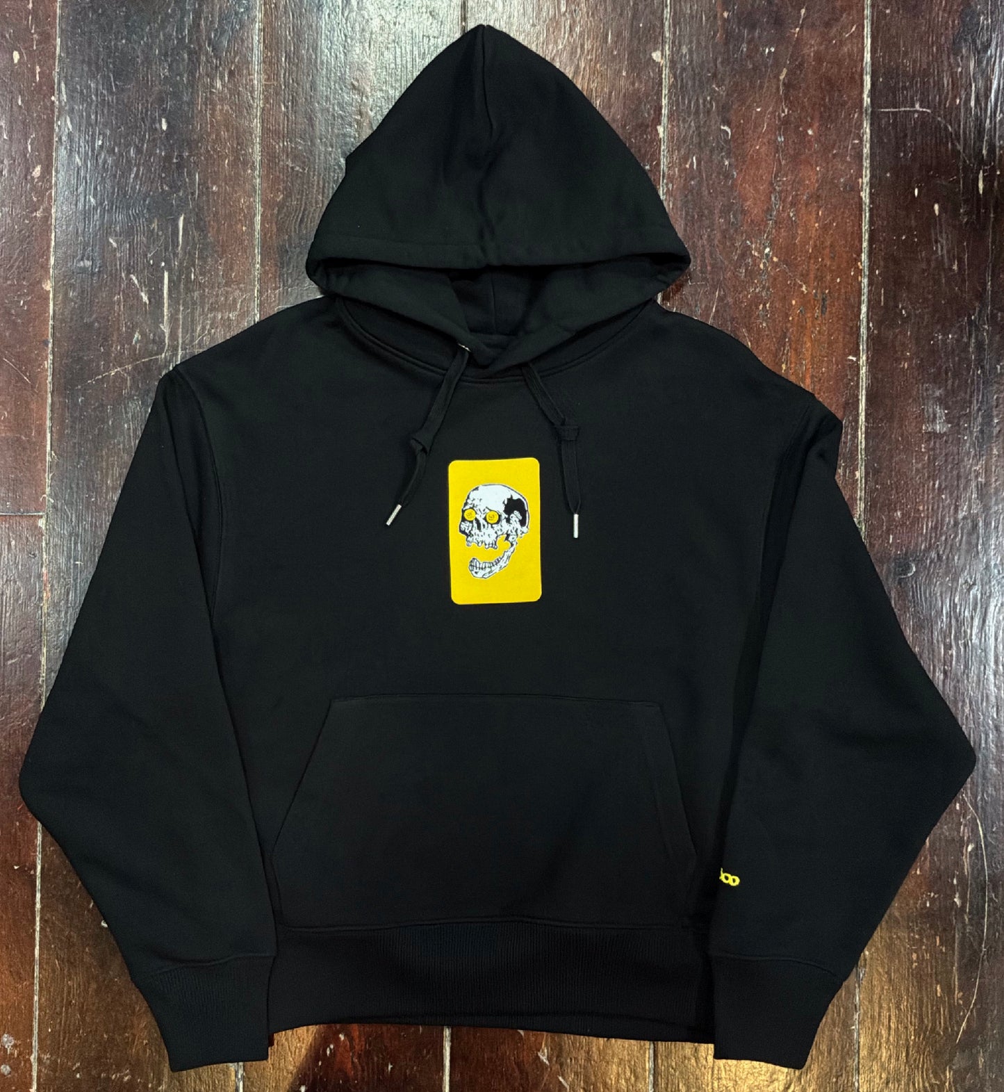 SUDADERA NEGRA CALAVERA CON MONEDAS EN LOS OJOS "CARONTE" 06800